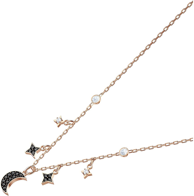 Swarovski Symbolic Moon Necklace with a Black Crystal Pavé Moon and Black and White Crystal Studded Star Charms on a Gold-Tone Plated Chain